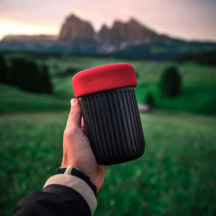 The complete aeropress go kit stored in the cup