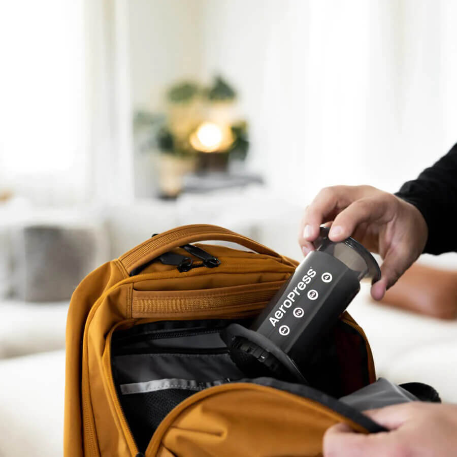 An Aeropress coffee maker that can fit in a backpack