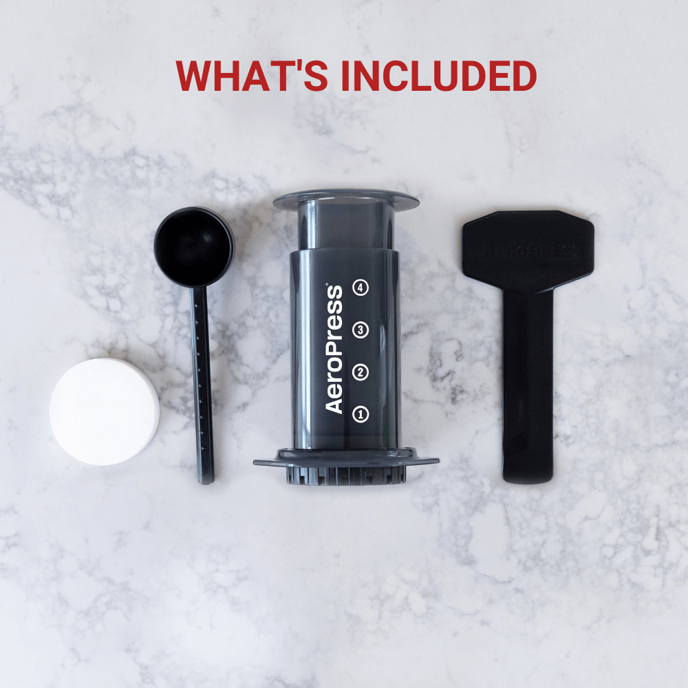 The full aeropress kit including filter paper, scoop, stirrer and Press