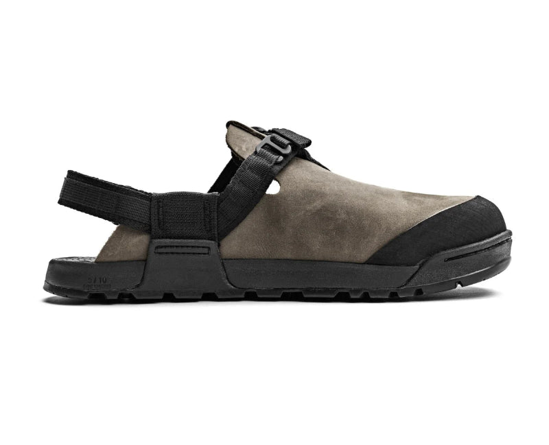 Brown sandal with black straps and sole on a white background