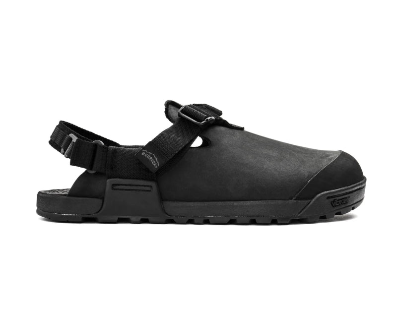 Black sandal with strap on a white background