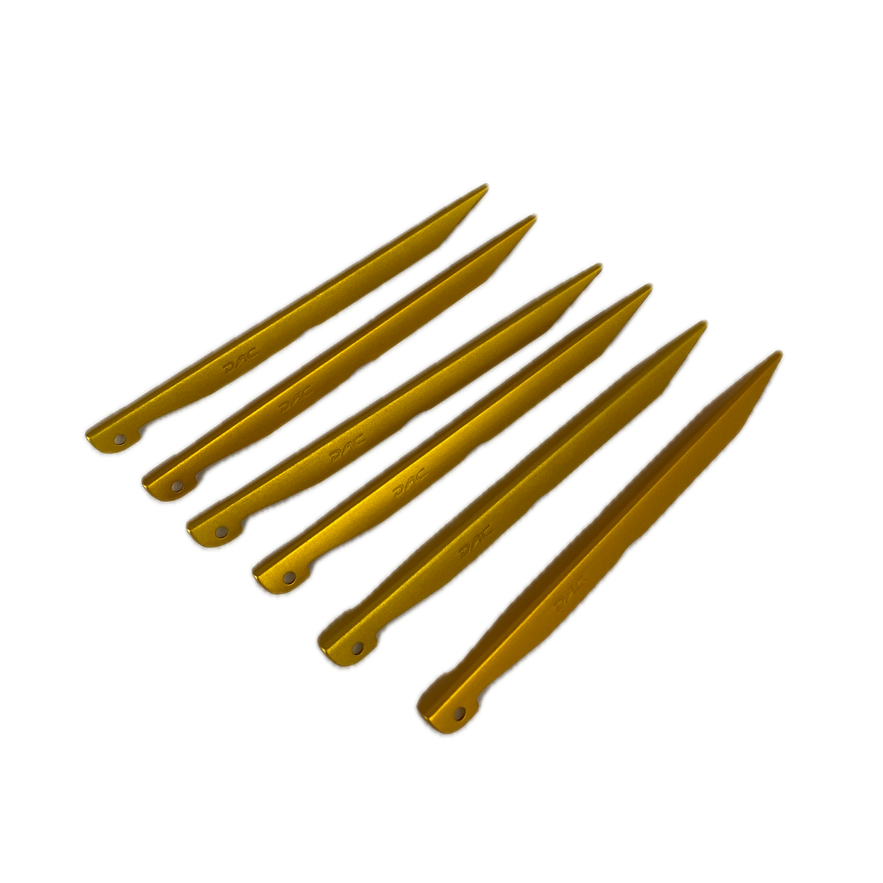 Set of gold-colored tent stakes on a white background