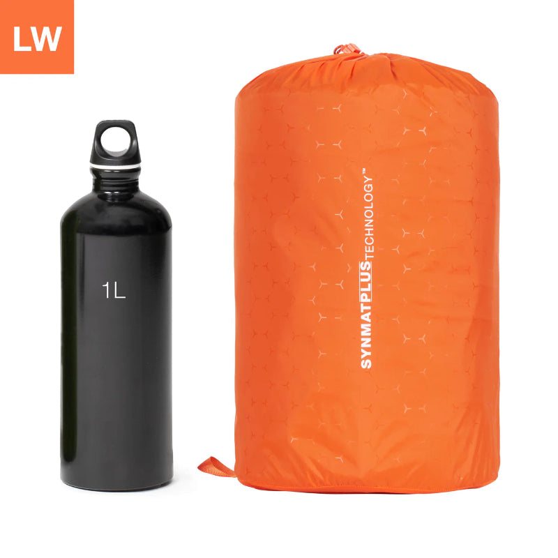 Orange compression sack and black water bottle on a white background