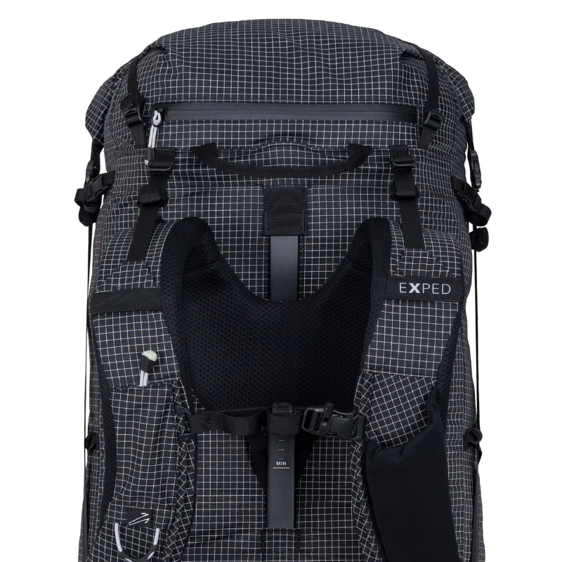 Backpack with grid pattern and 'Exped' branding on a white background