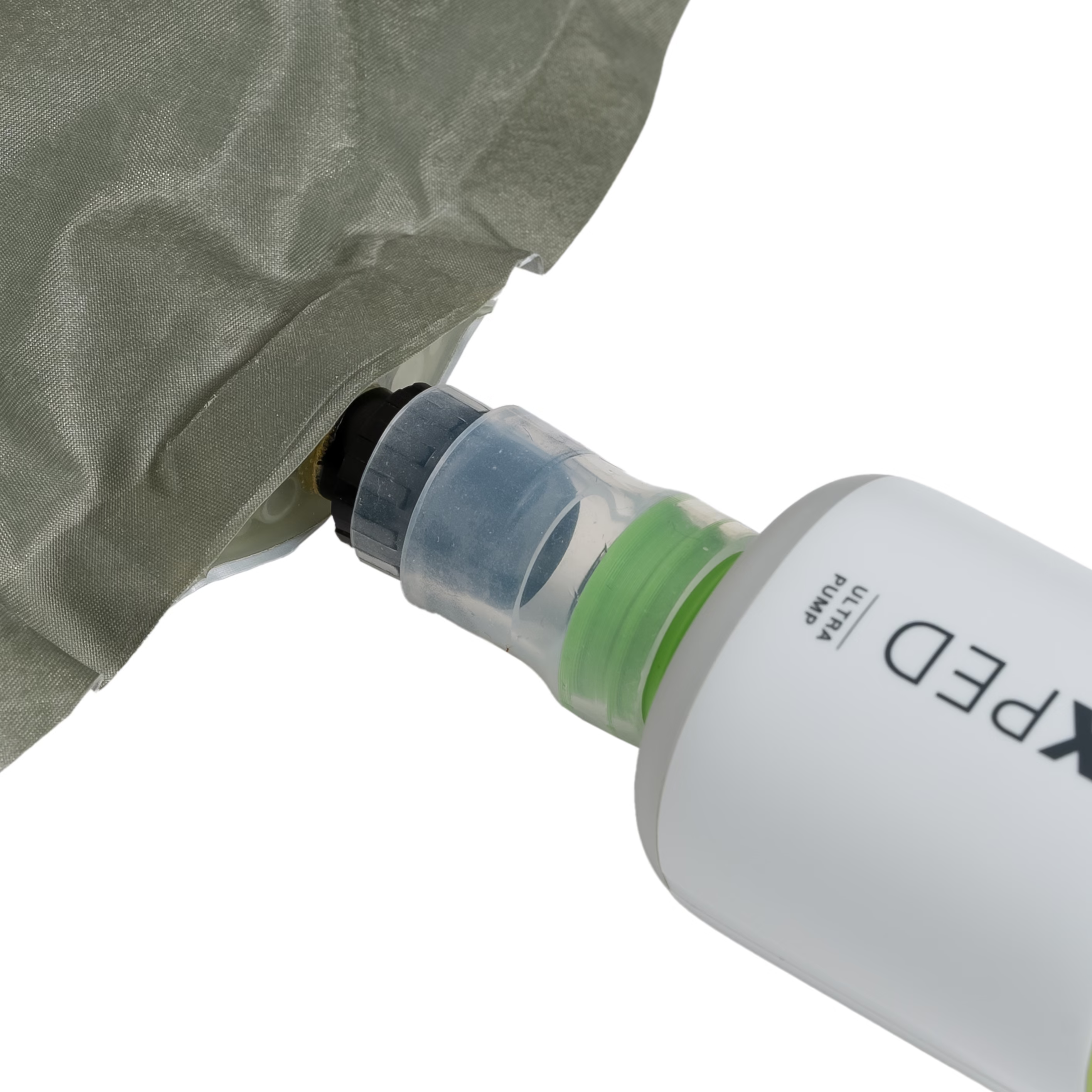 Close-up of an ultra pump with a green cap attached to a gray fabric surface.