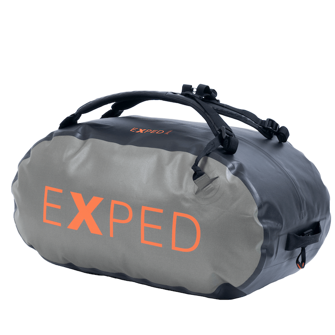 A gray Exped Tempest 70 Duffle bag with orange branding, featuring a waterproof zipper and padded shoulder straps.