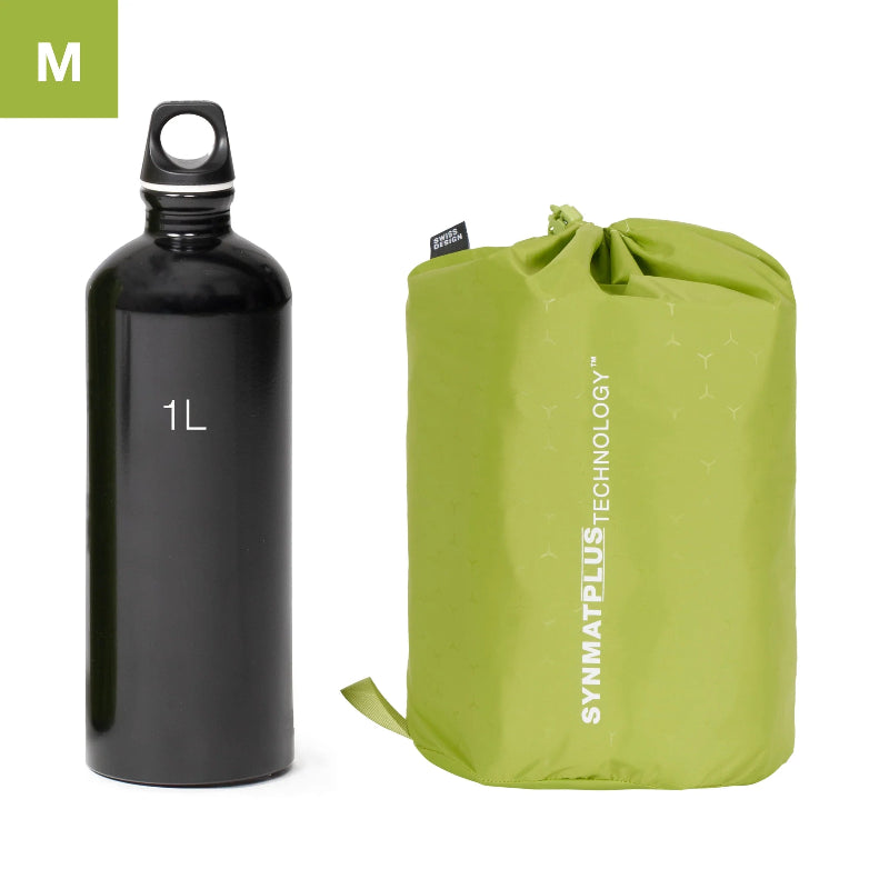 Black water bottle and green compression sack with SYNMATPLUS TECHNOLOGY branding on a white background.