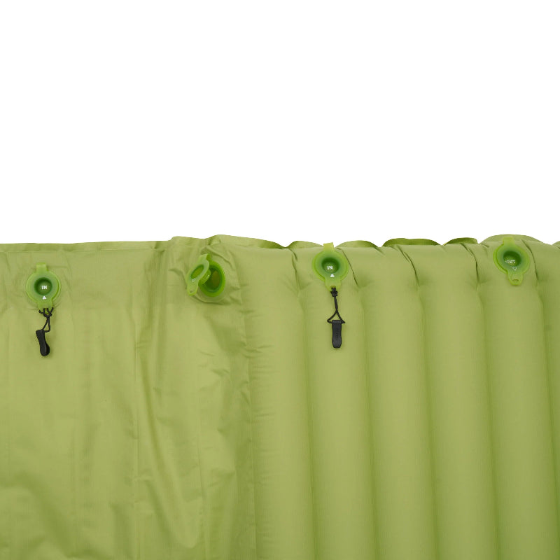 Green inflatable mattress with zipper and hooks on a white background