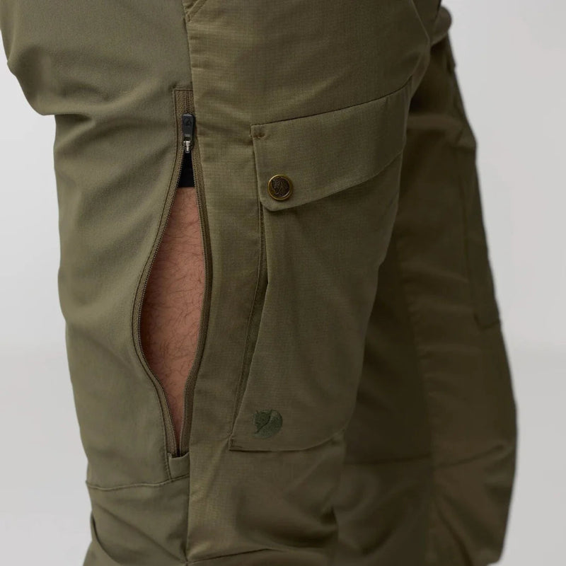 Close-up pants with ventilation zips on a white background