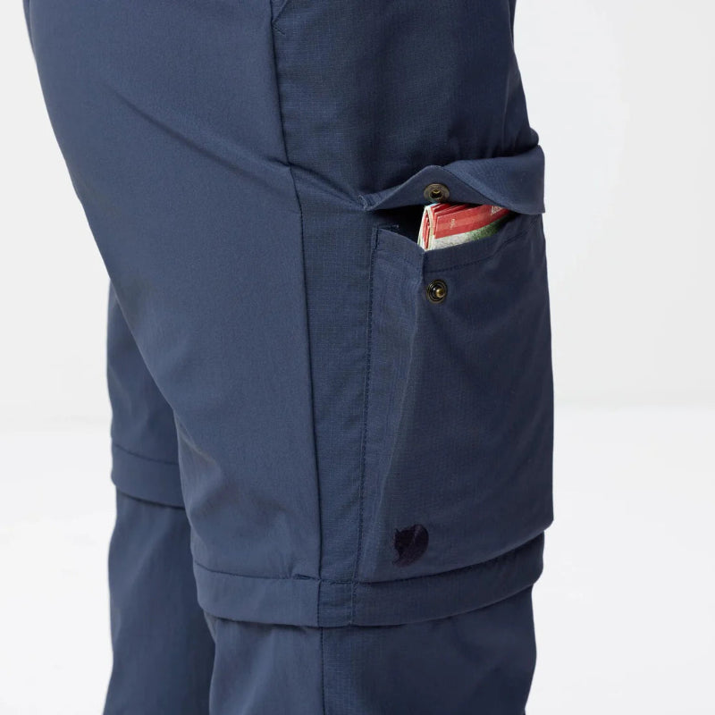Navy blue pants with a pocket on a white background