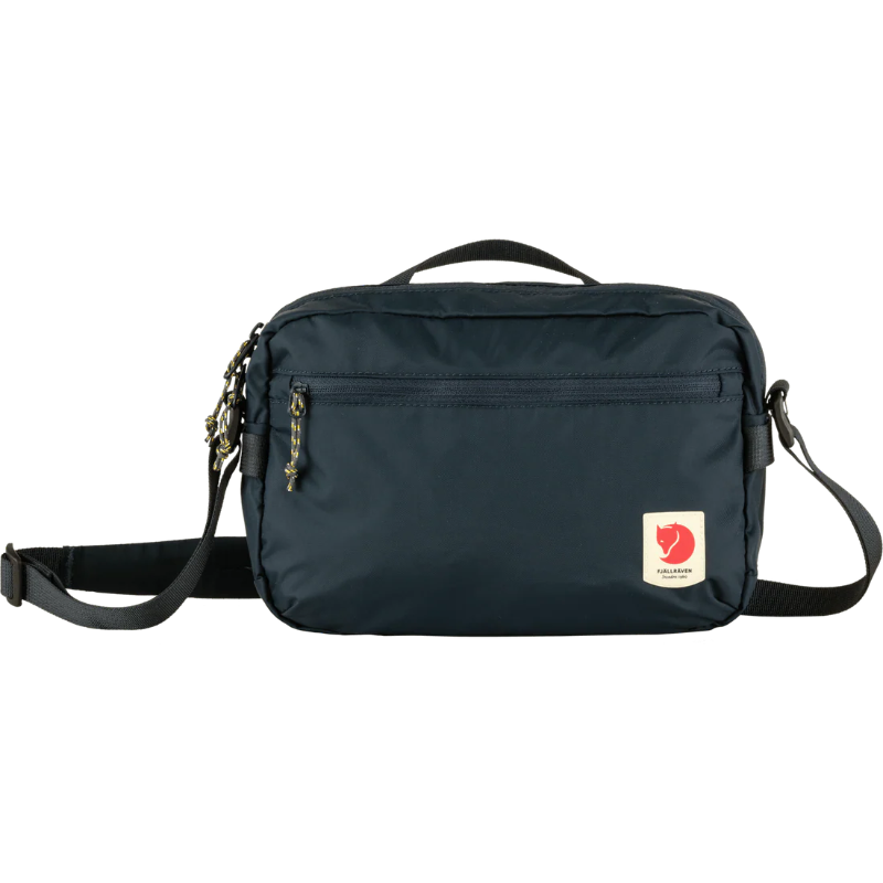 Navy shoulder bag with a visible brand logo on a white background