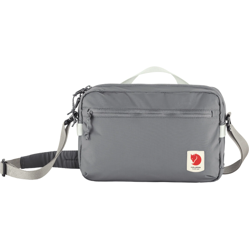 Gray shoulder bag with a visible brand logo on a white background