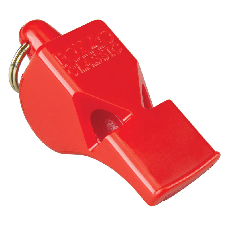 red whistle on a white background