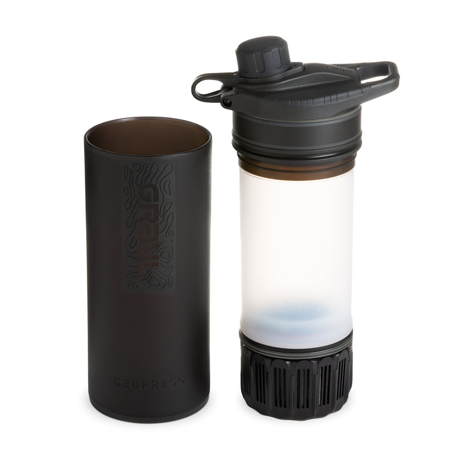 Grayl water filtration bottle with a transparent insert on a white background