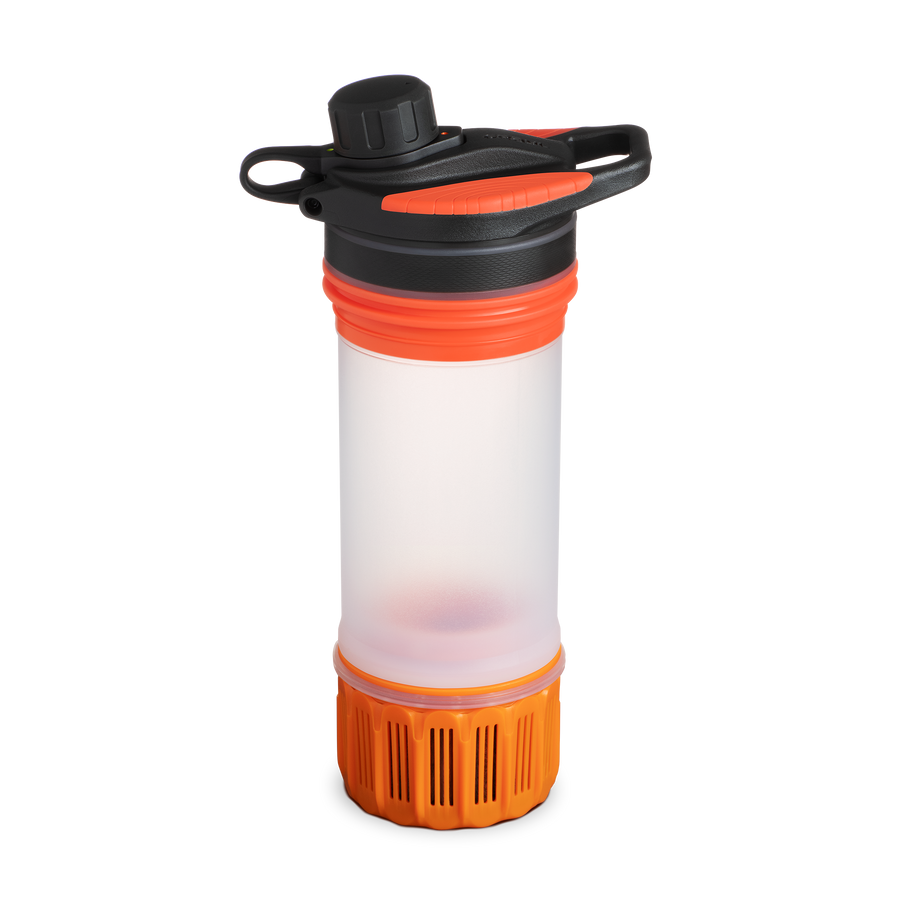 Orange and black water filter inner from the grayl water bottle with a clear middle section on a white background