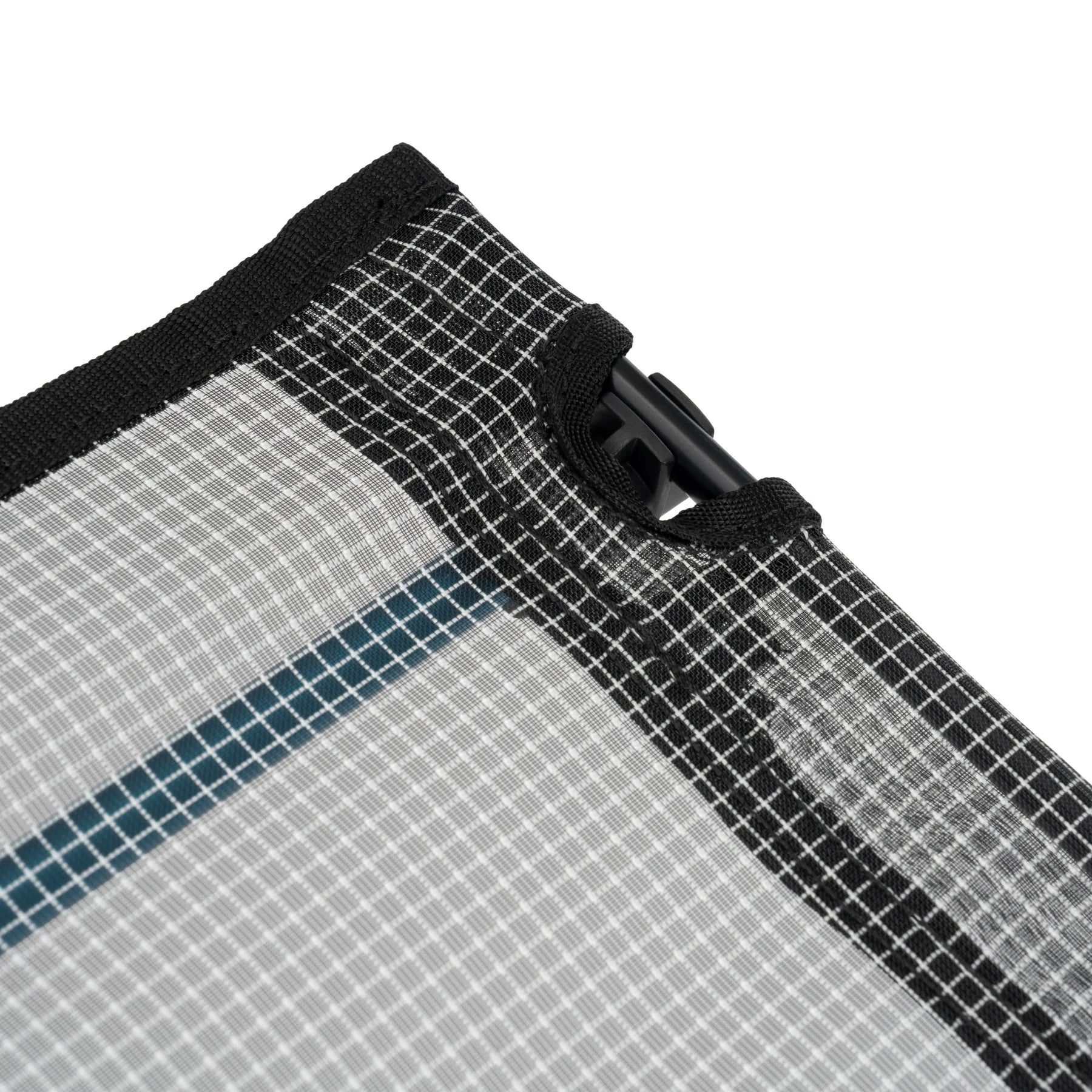 Close-up of Helinox Camping Table with mesh and black frame on a white background