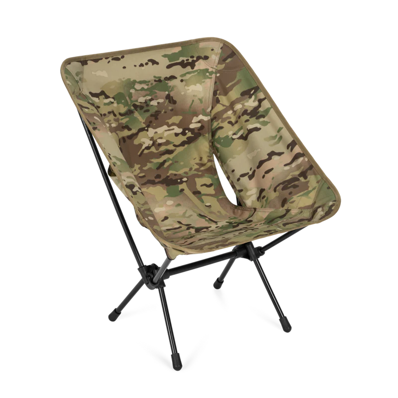 Camouflage folding chair with black metal legs on a white background