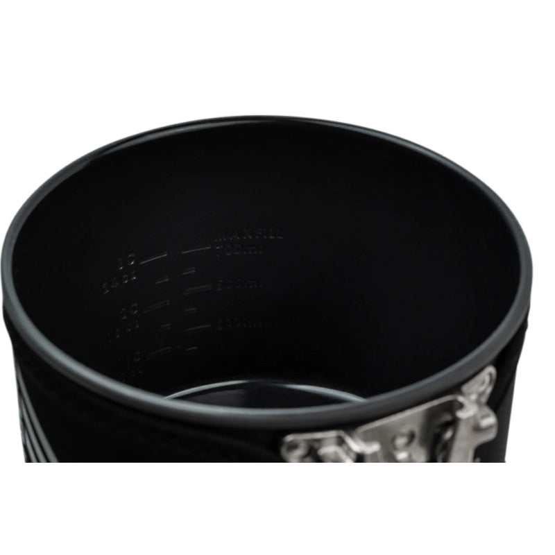 Black pot with measuring lines on a white background