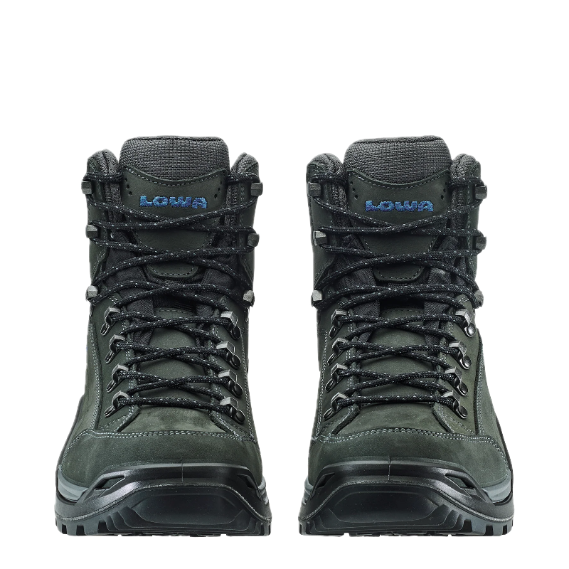 Pair of black hiking boots with visible brand name on a white background