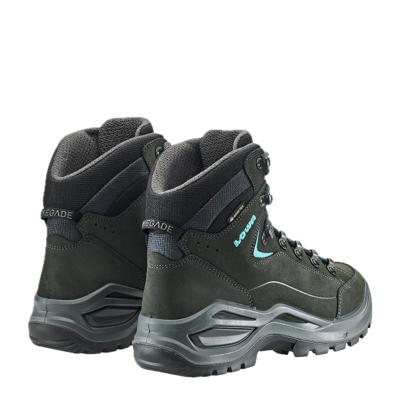 Pair of gray hiking boots with brand name on a white background