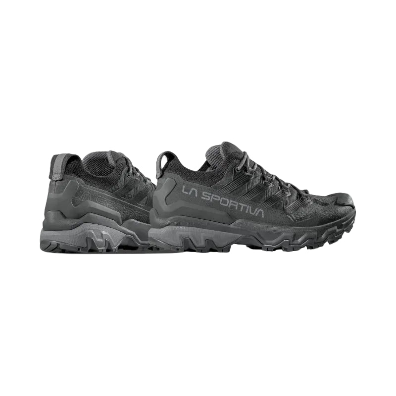 Pair of gray La Sportiva hiking shoes on a light gray background