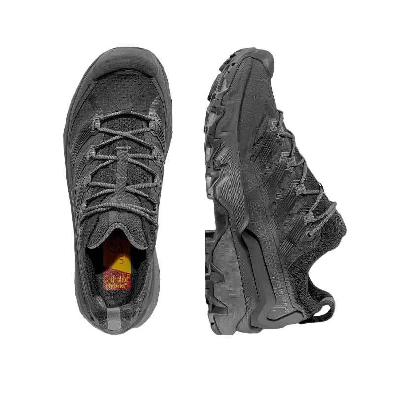 Black hiking shoes with lace-up design on a light gray background