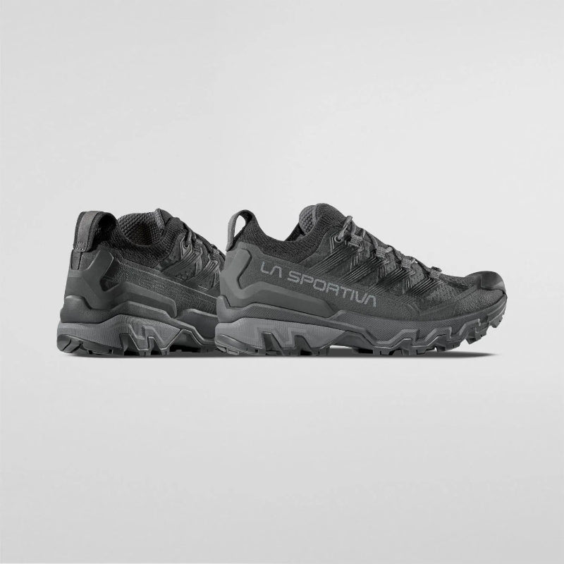 Black La Sportiva shoes on a white background