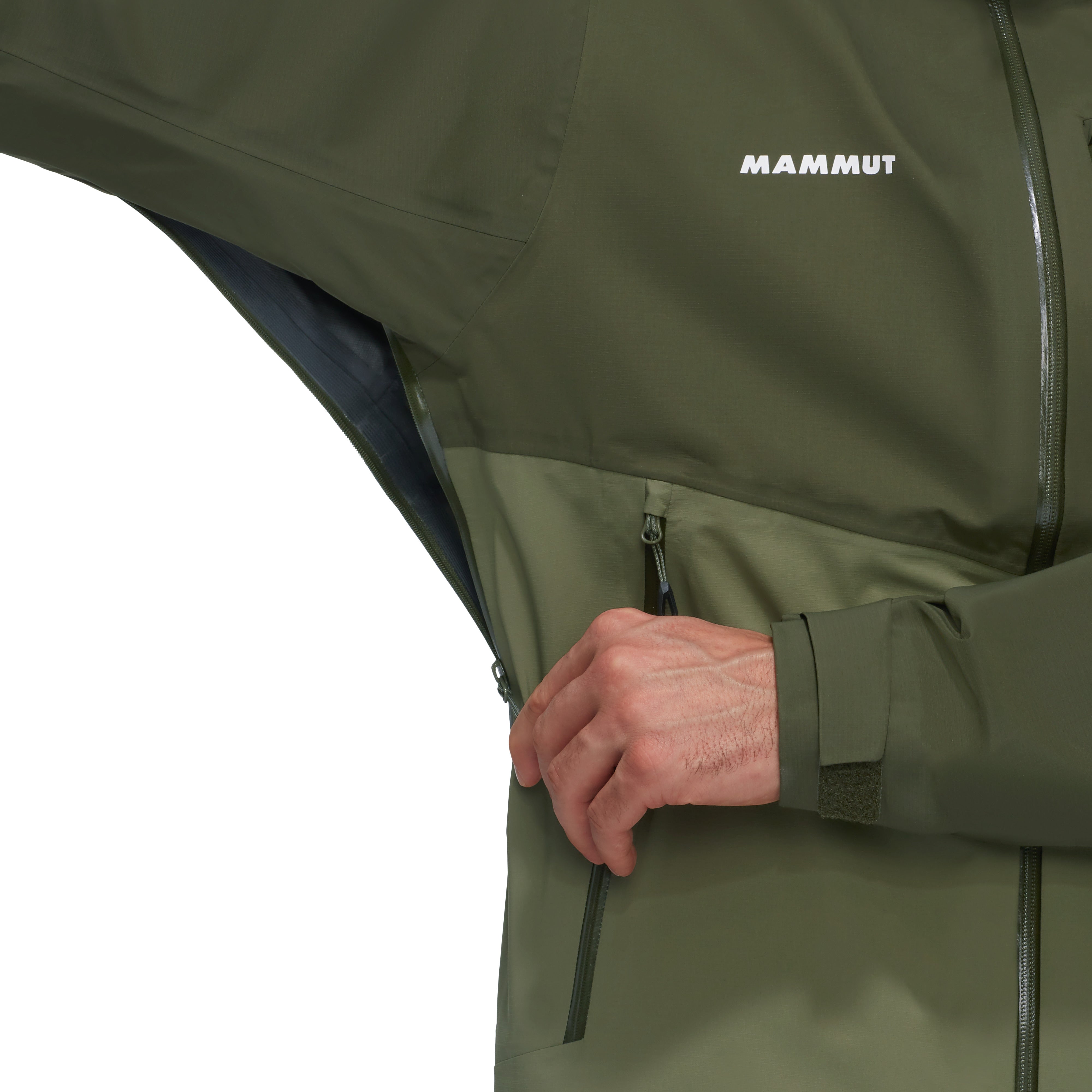 Green jacket with a hand reaching into the pocket, featuring the Mammut brand.