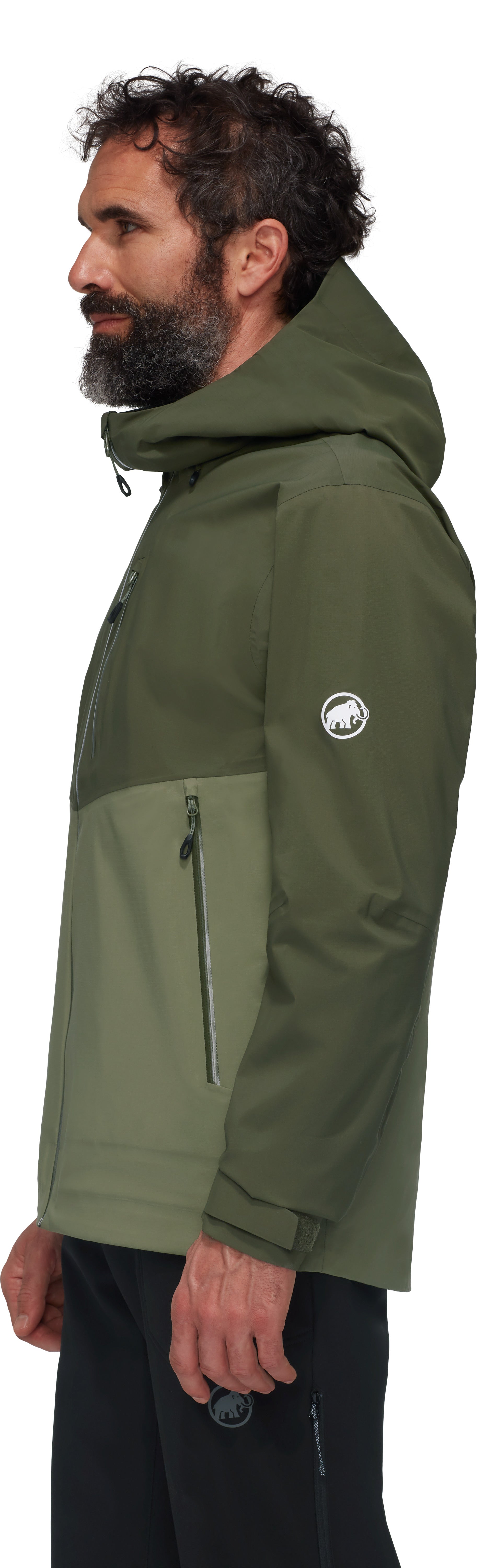 Man wearing a green jacket with a brand logo on a white background