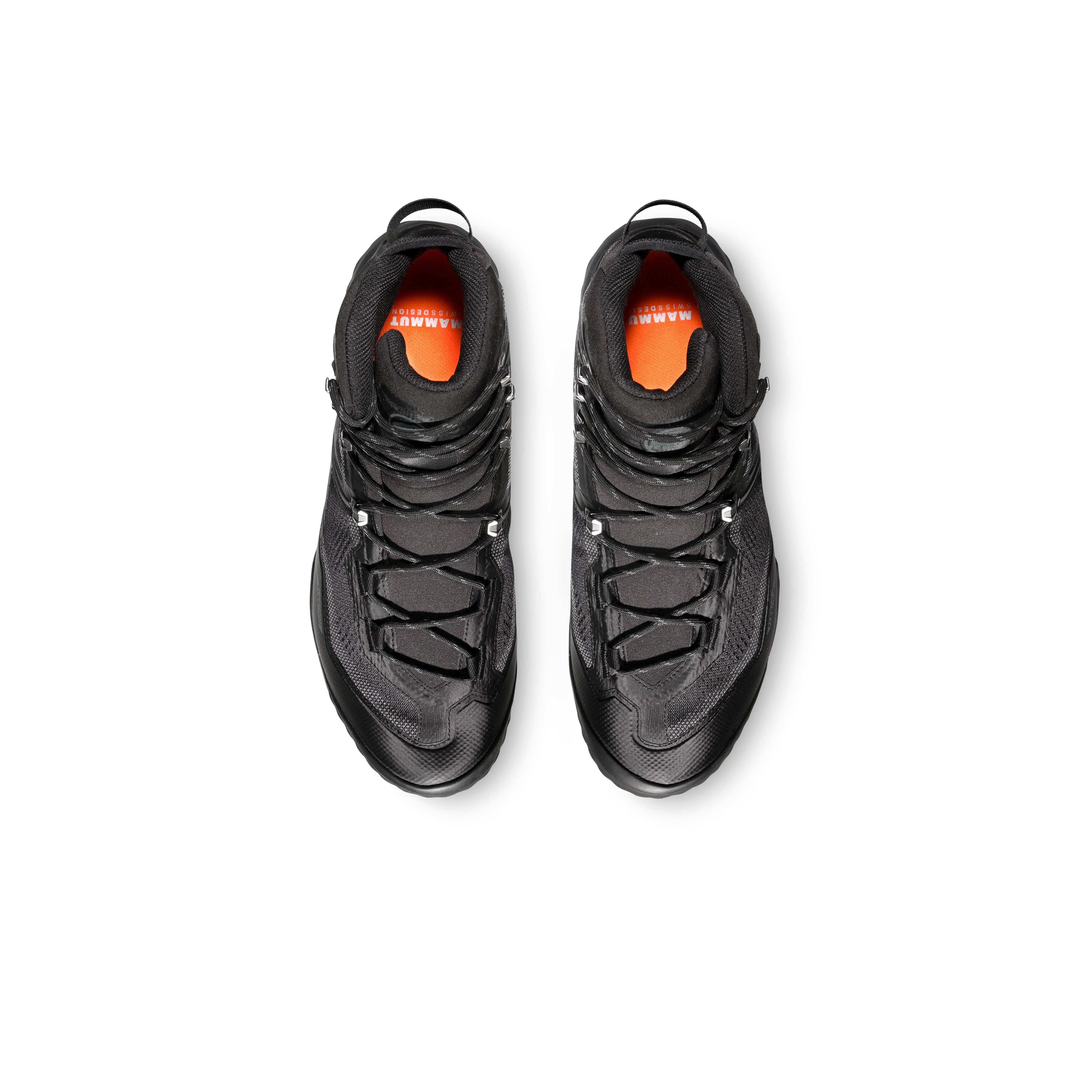 Black sneakers with orange accents on a white background