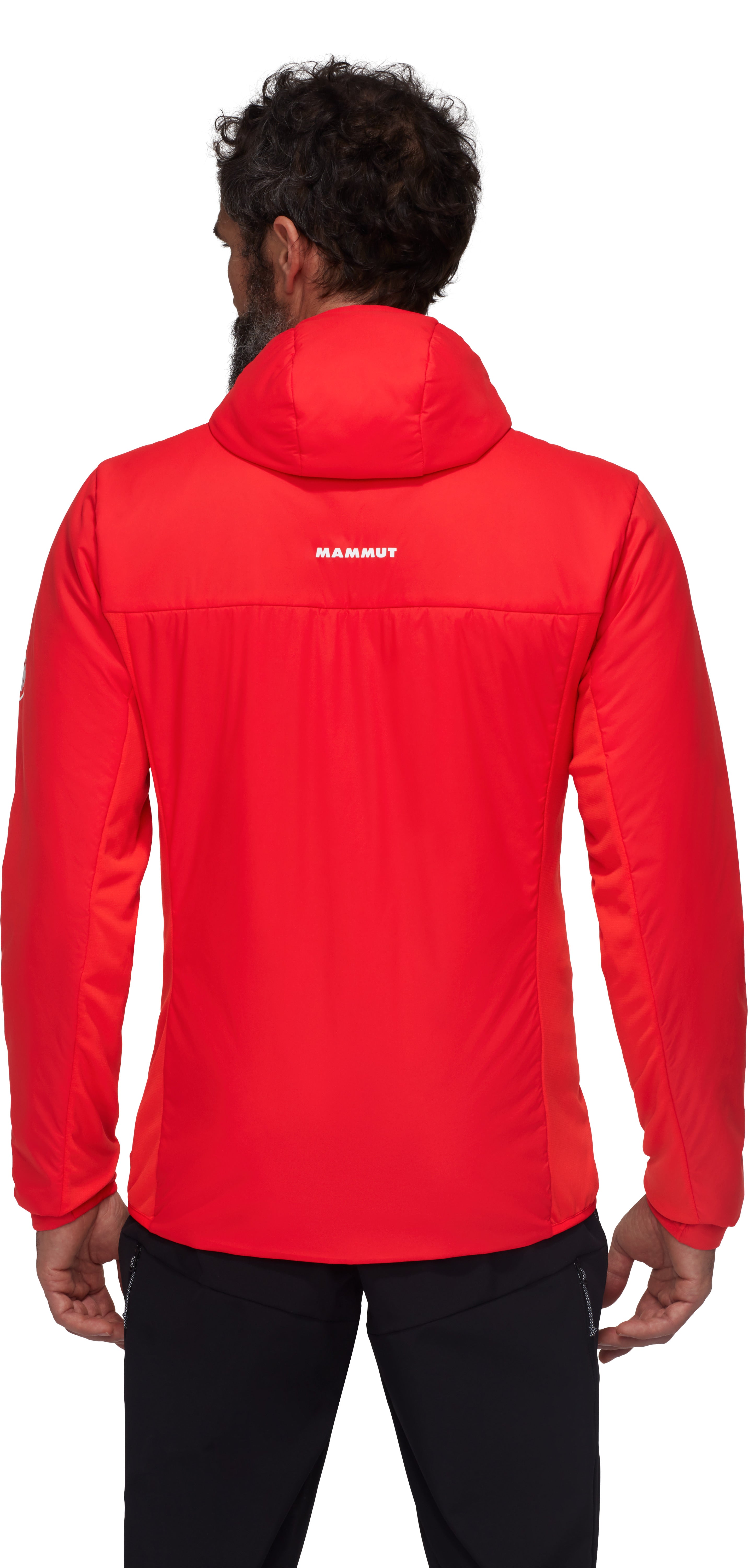 Person wearing a red jacket with 'Mammut' branding on the back, on a white background
