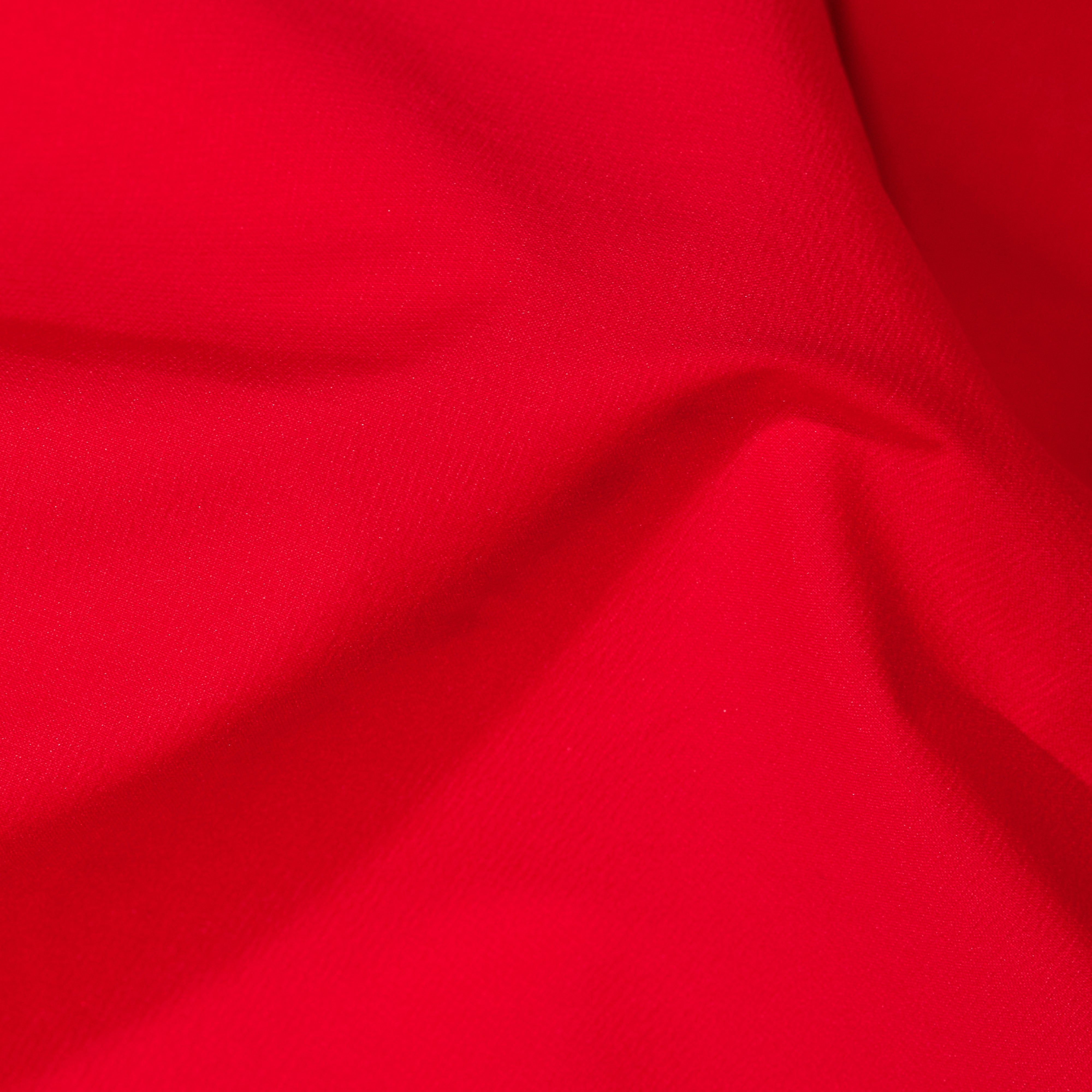Close-up of red fabric with folds