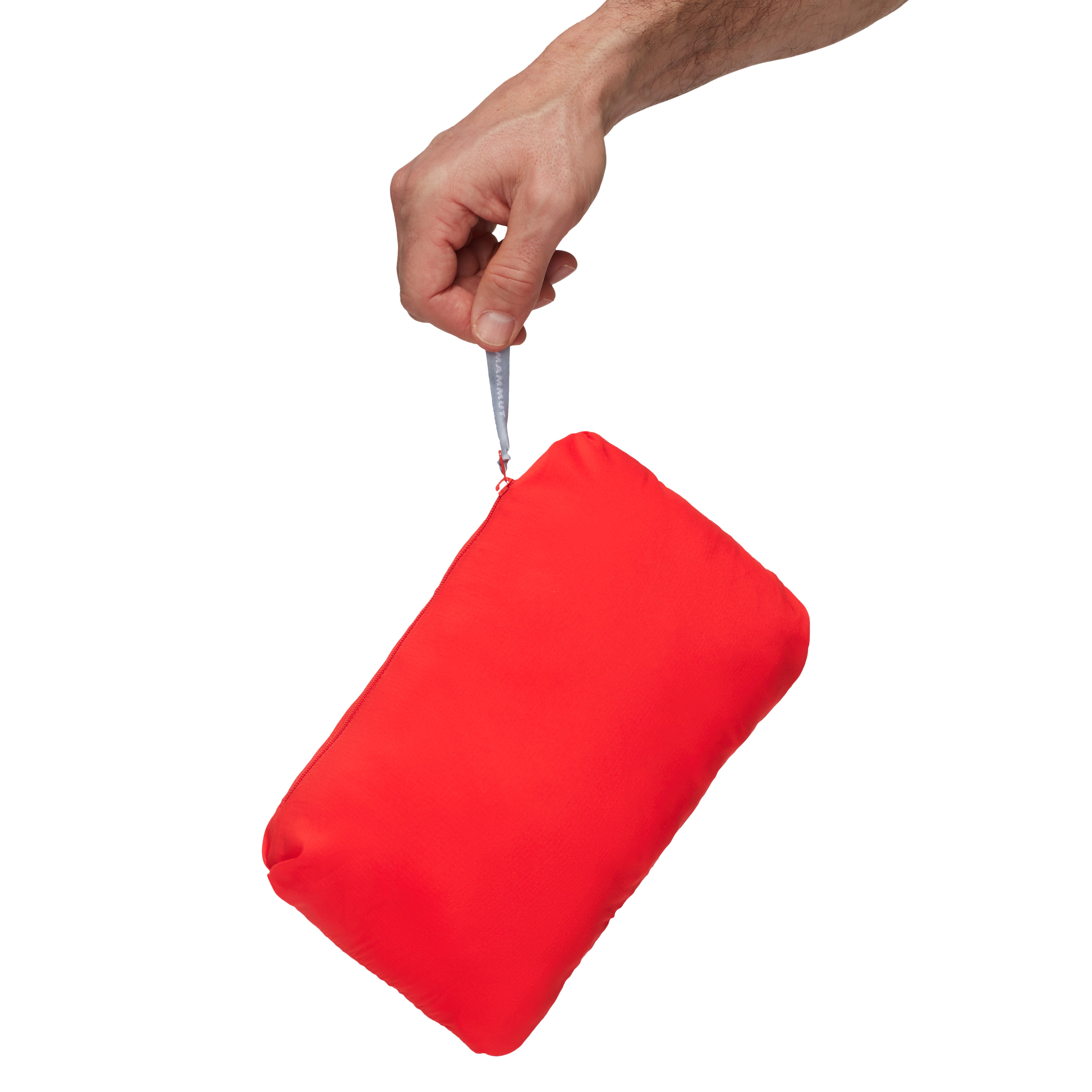 Hand holding a red bag on a white background