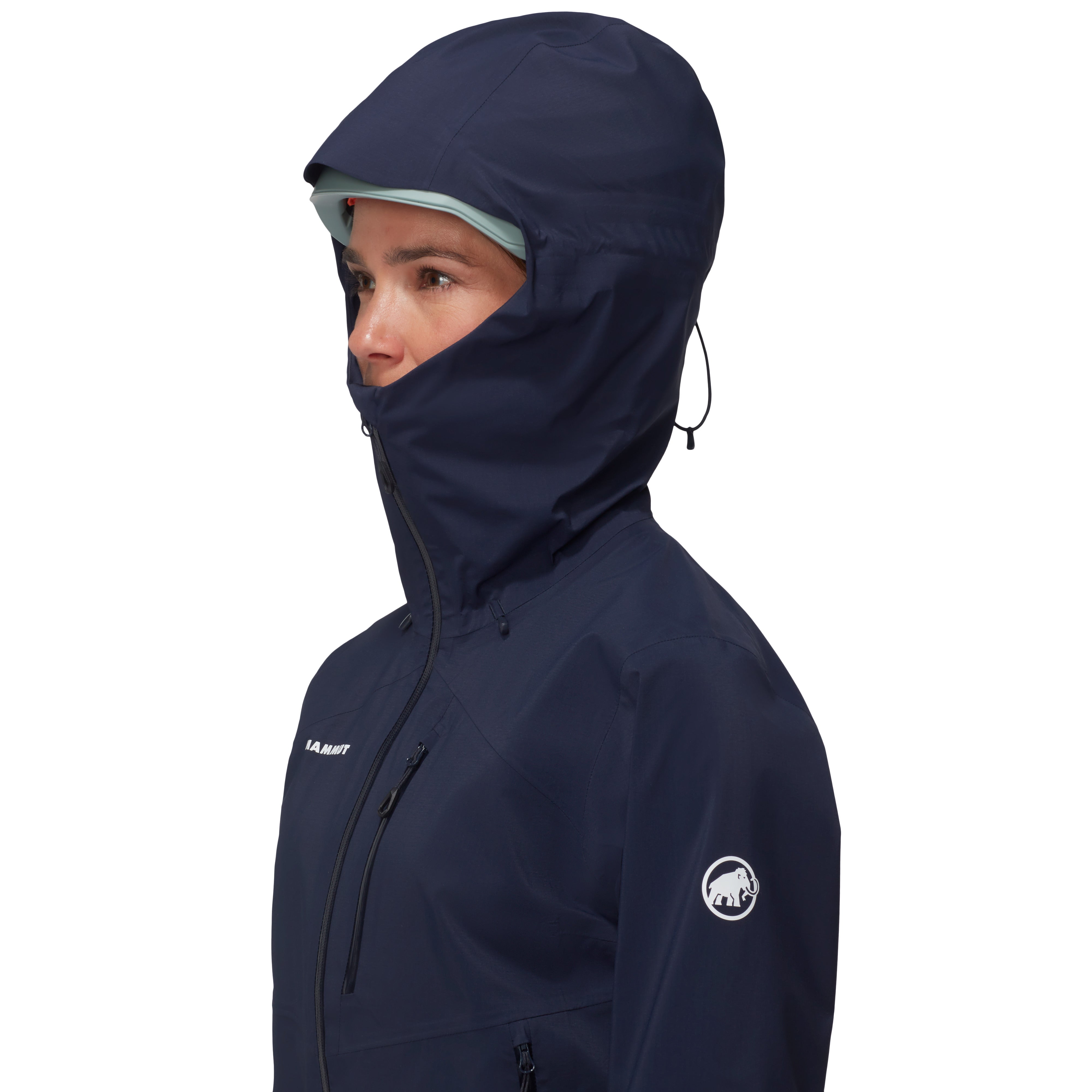 Person wearing a navy blue jacket with a hood on a white background