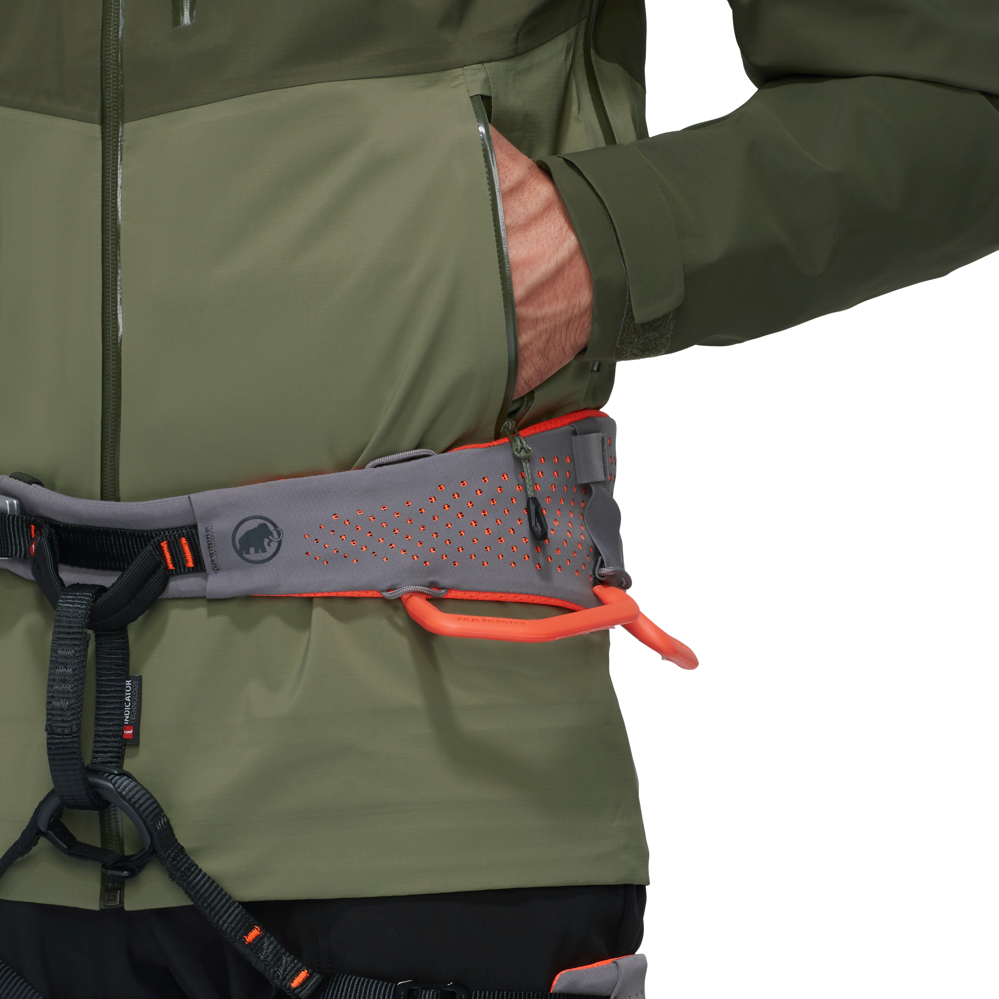 Person wearing a green jacket with climbing gear on a white background