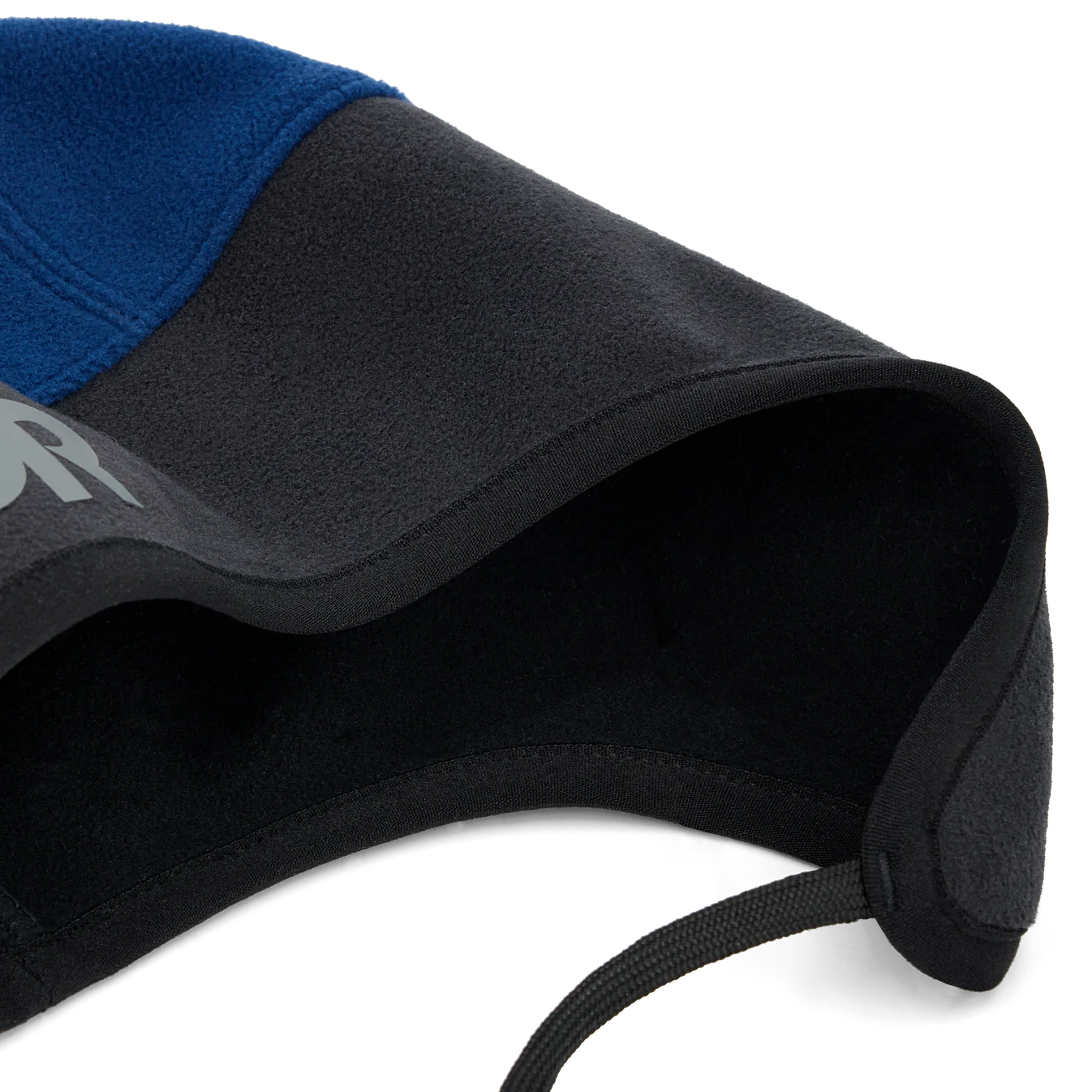 Close-up of a black and blue hat with a brand logo on a white background