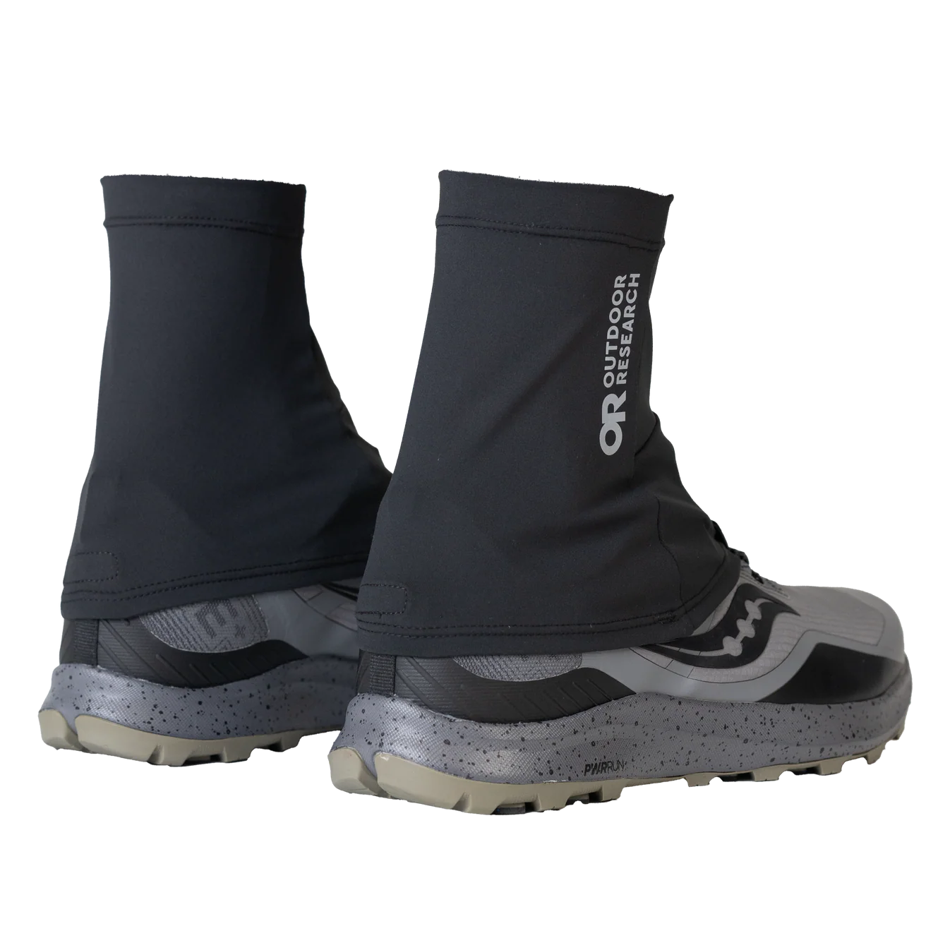 Black gaiters with 'Outdoor Research' branding on a white background