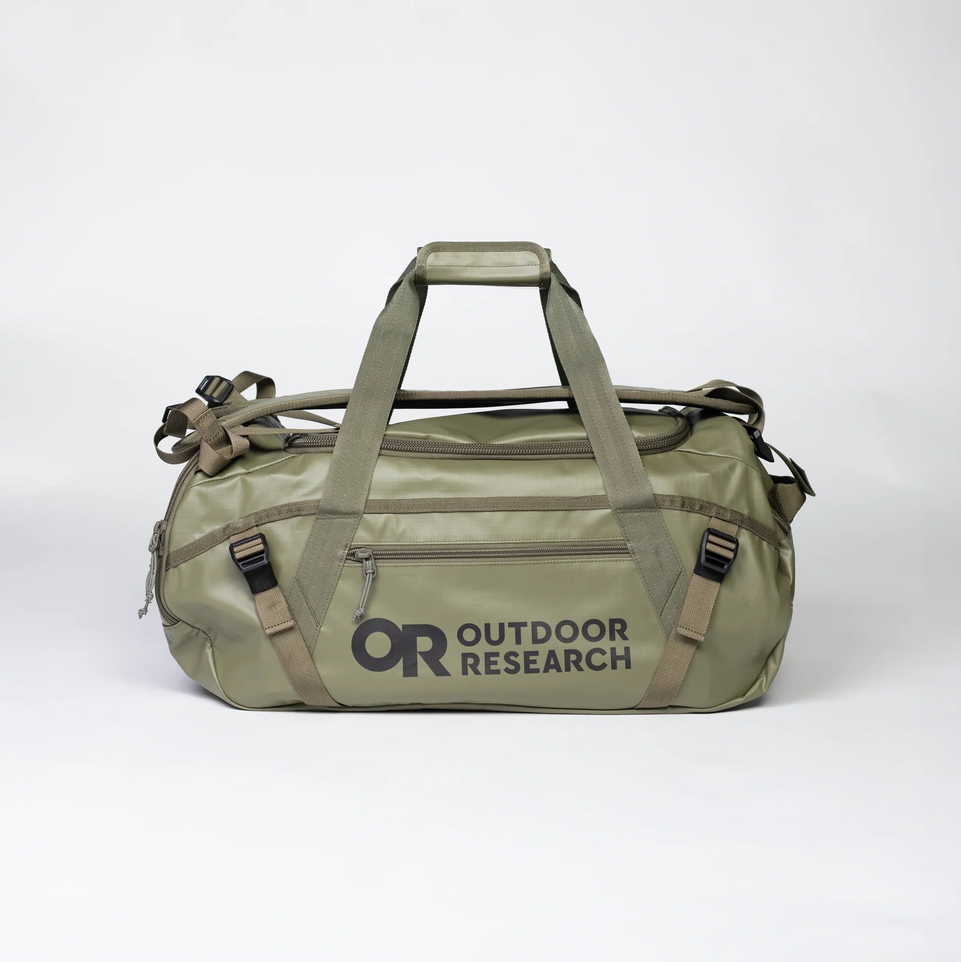 Green duffel bag with 'Outdoor Research' logo on a white background