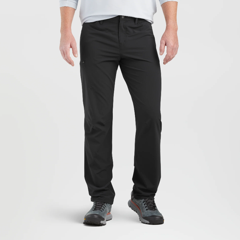 Person wearing black pants on a white background