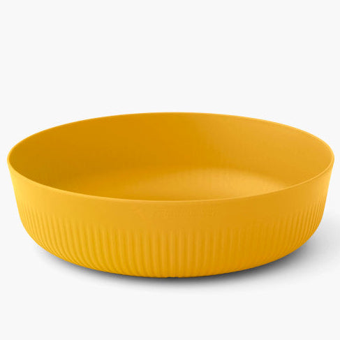 A yellow Sea to Summit Passage bowl with Cool Grip fins, designed for secure grip and spill prevention.