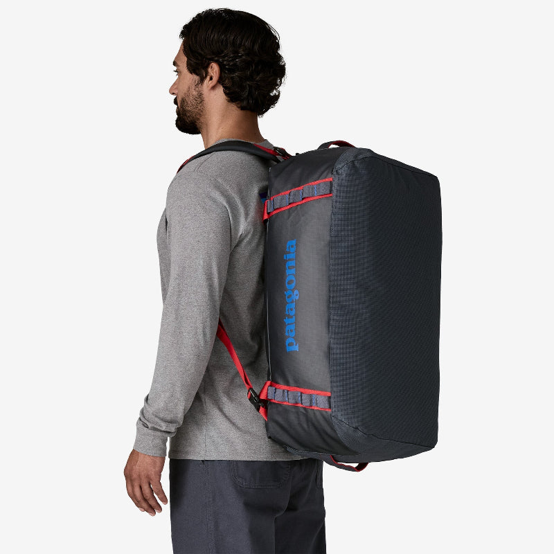 Man wearing the Patagonia Black Hole Duffel 55L on his back
