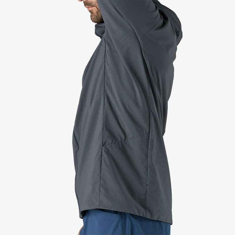 Man stretching his arms up weaing the Patagonia Men's Nano-Air® Ultralight Full-Zip Hoody