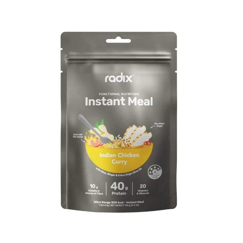 A stand-up pouch of radix Instant Meal in Indian Chicken Curry flavor, shown on a plain white background. The packaging is dark gray with white text and a yellow bowl illustration on the front.