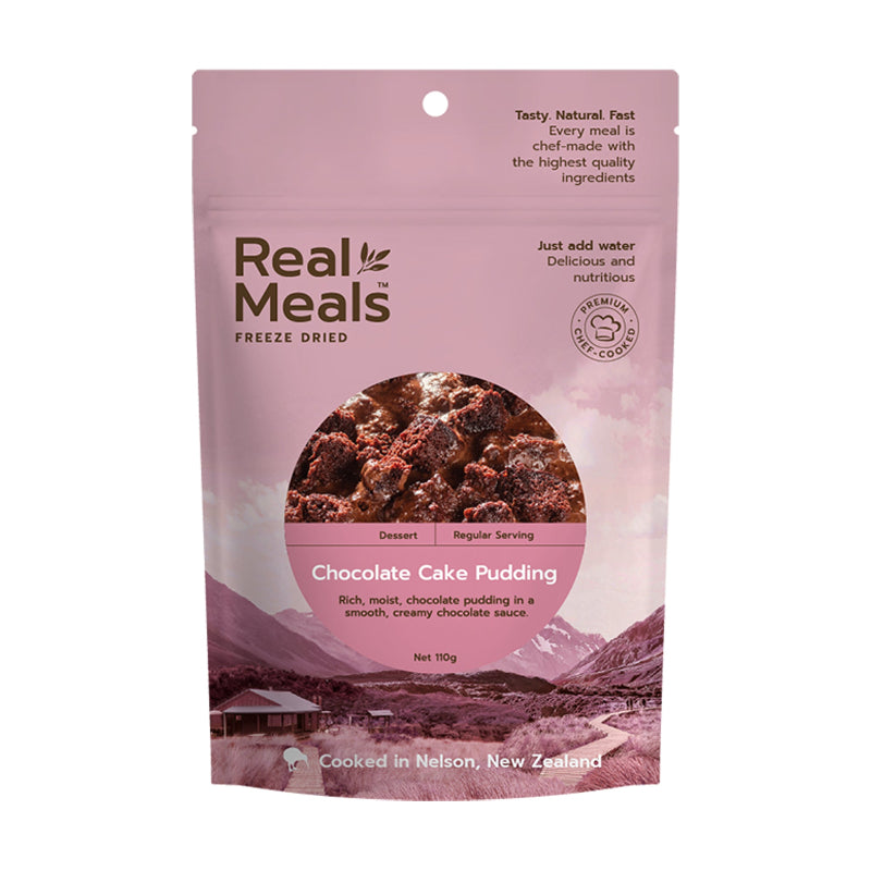 Package of Real Meals freeze-dried chocolate cake pudding on a pink background