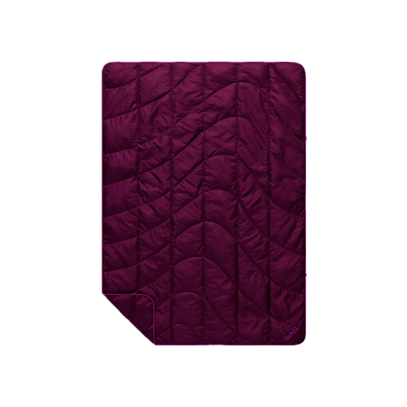 Rumpl Travel Puffy Blanket Plum laid out