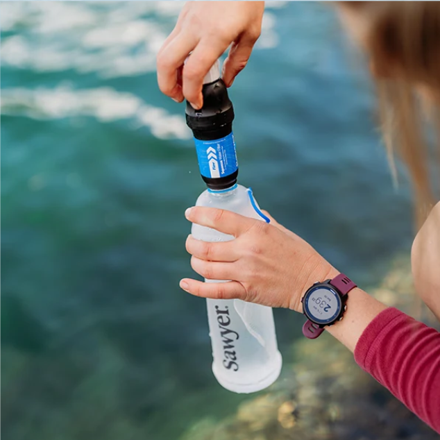 Sawyer Squeeze Water Filtration System screwing onto Cnoc 1L Bottle