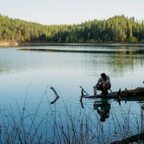 Sawyer Squeeze Water Filtration System w/ Cnoc Premium 2L Bladder used at a lake