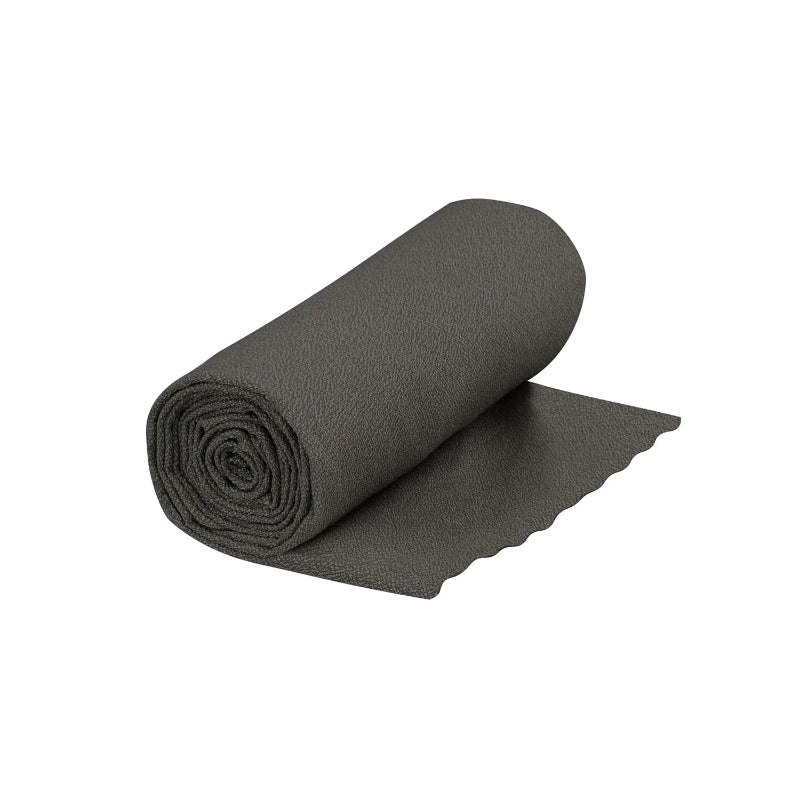 Rolled-up black mat on a white background