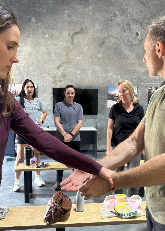 Women learning in a self defence class in Sydney NSW