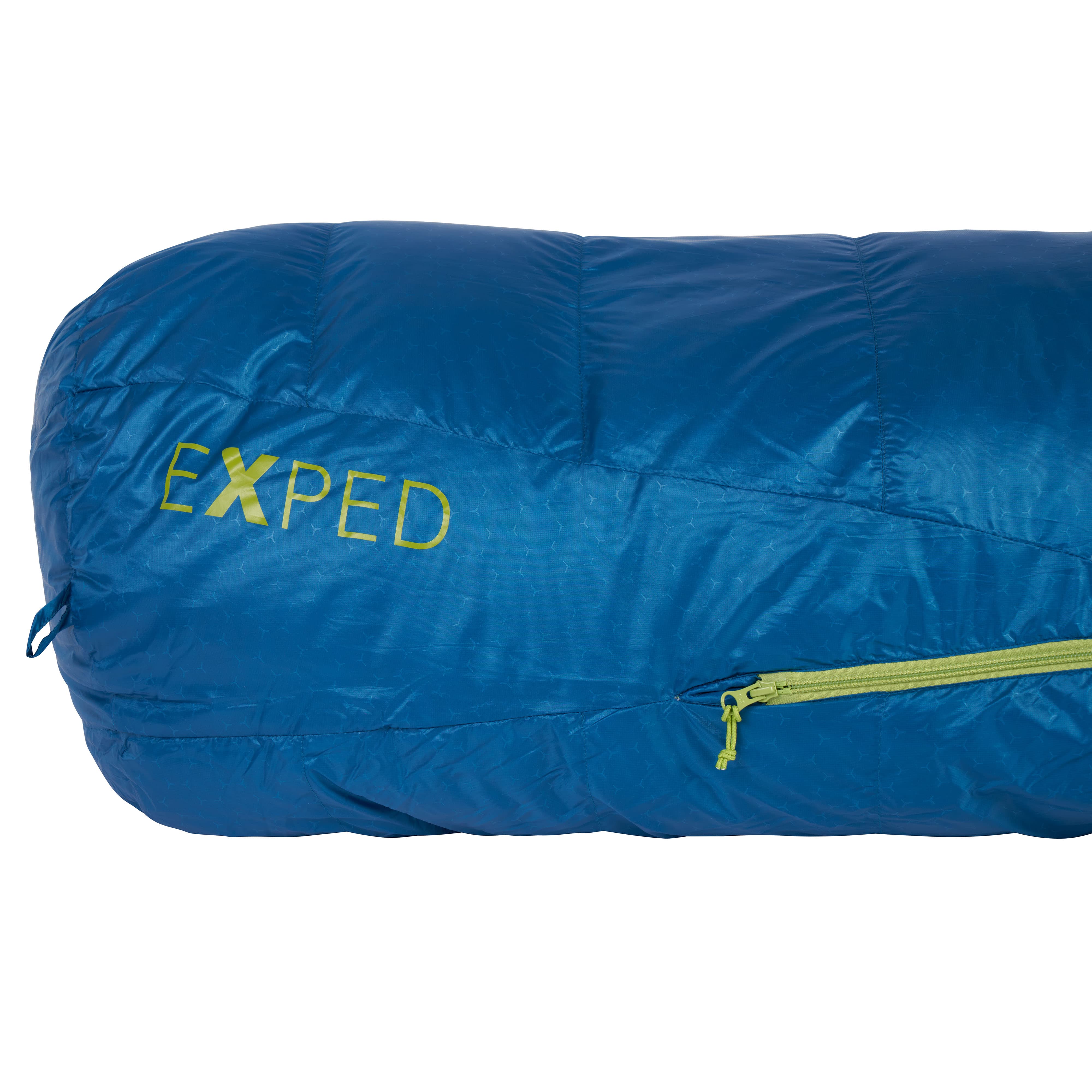 Blue sleeping bag with yellow zipper and 'Exped' branding on a white background